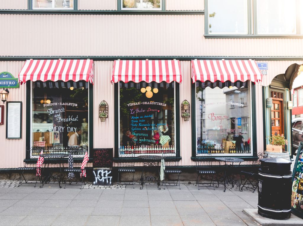 Image showing store front with striped red awnings 